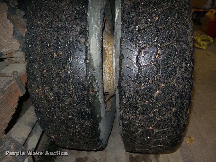 image for item L4184 1999 Sterling L8513 flatbed truck with crane