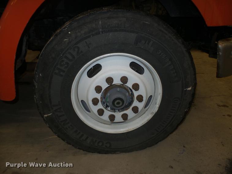 image for item L4184 1999 Sterling L8513 flatbed truck with crane