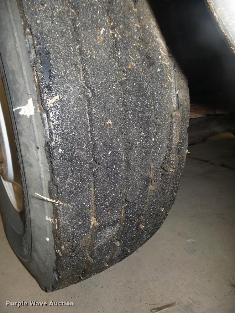 image for item L4184 1999 Sterling L8513 flatbed truck with crane