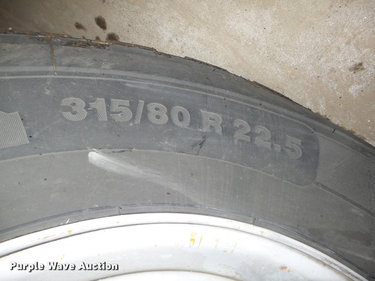 image for item L4184 1999 Sterling L8513 flatbed truck with crane