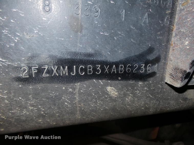 image for item L4184 1999 Sterling L8513 flatbed truck with crane