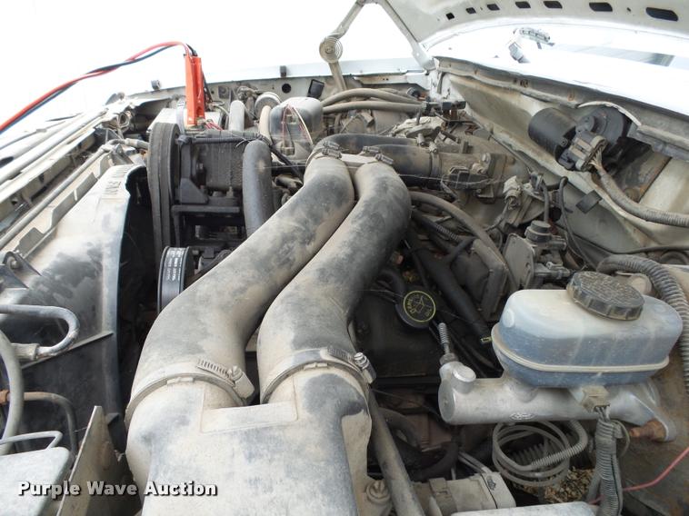 image for item K1009 1995 Ford F350 refuse truck