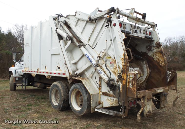 image for item K1010 2002 GMC C8500 refuse truck