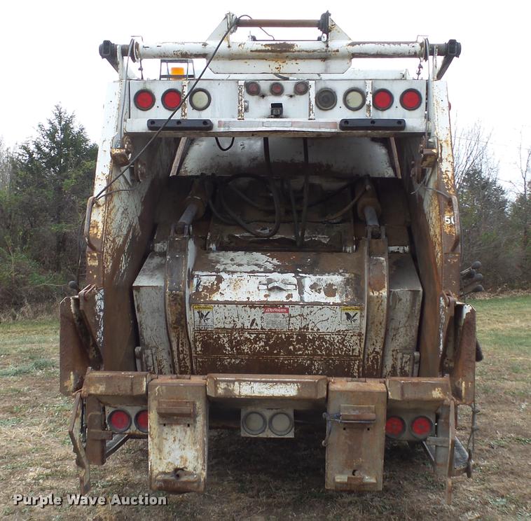 image for item K1010 2002 GMC C8500 refuse truck
