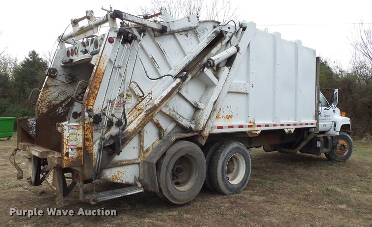 image for item K1010 2002 GMC C8500 refuse truck