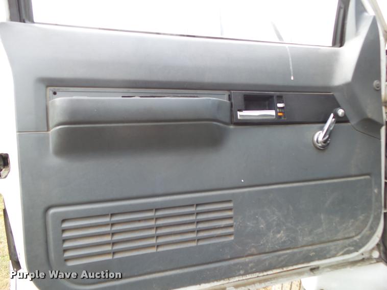 image for item K1010 2002 GMC C8500 refuse truck