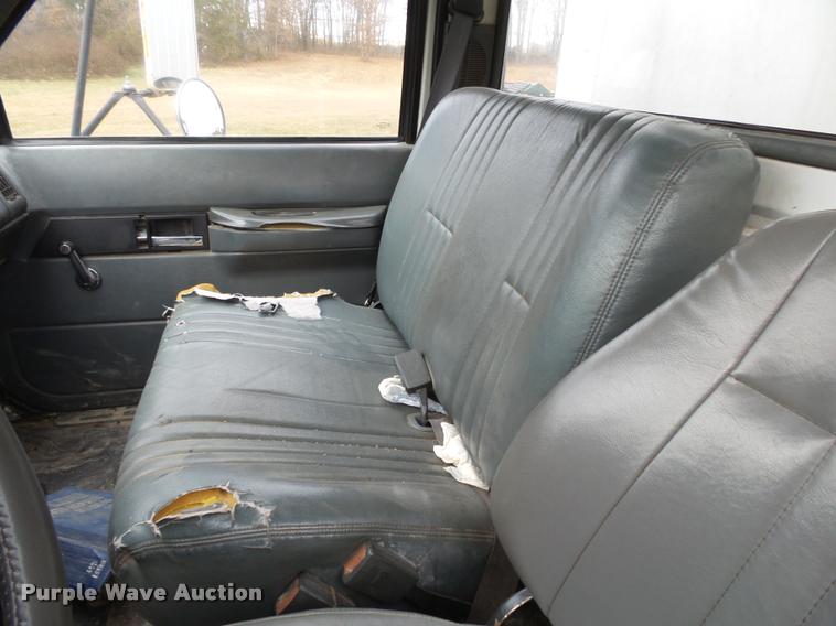 image for item K1010 2002 GMC C8500 refuse truck