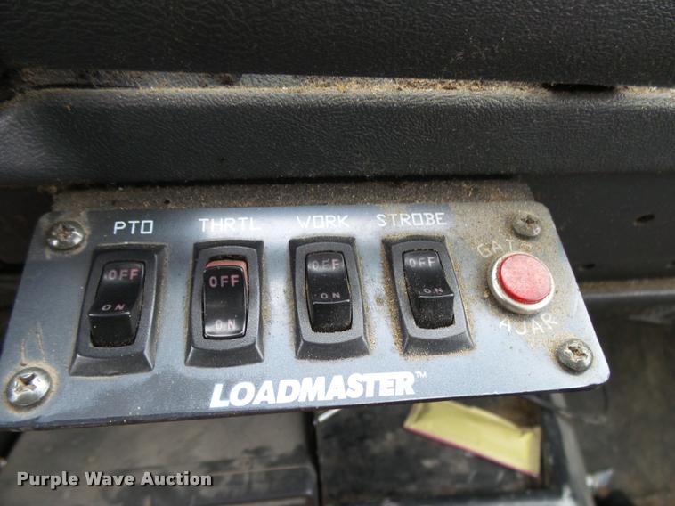 image for item K1010 2002 GMC C8500 refuse truck