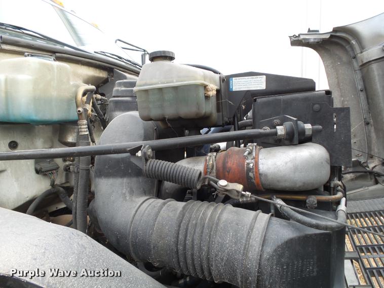 image for item K1010 2002 GMC C8500 refuse truck