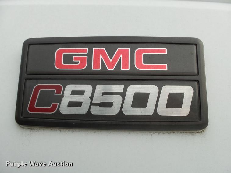 image for item K1010 2002 GMC C8500 refuse truck