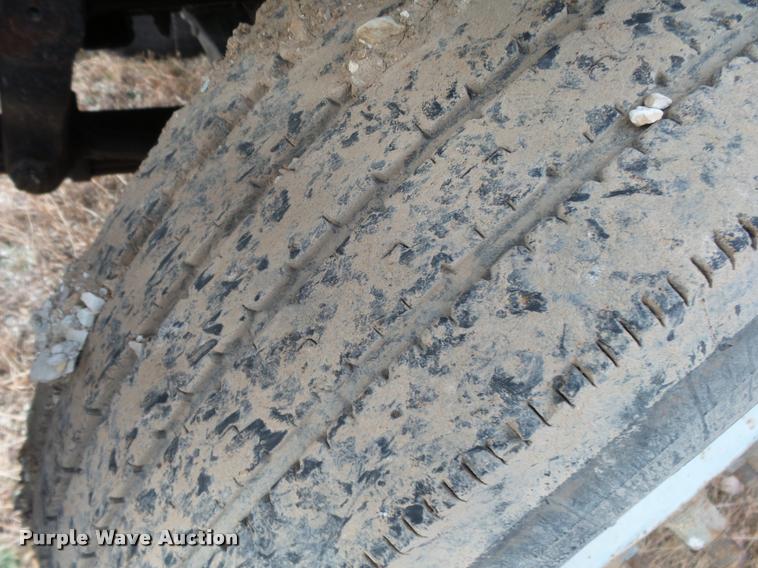 image for item K1010 2002 GMC C8500 refuse truck