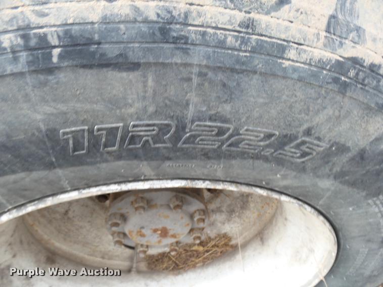 image for item K1010 2002 GMC C8500 refuse truck