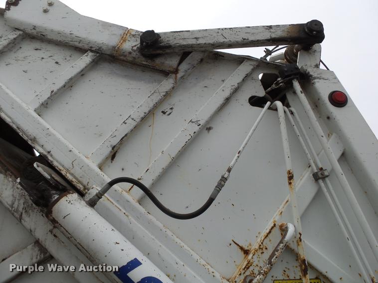 image for item K1010 2002 GMC C8500 refuse truck