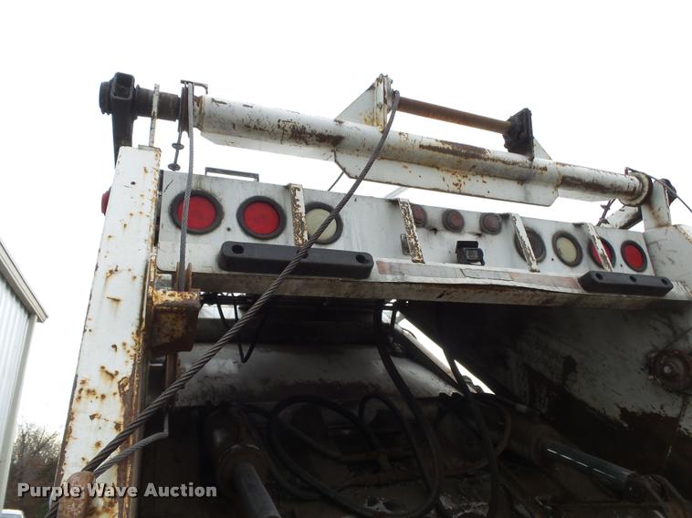 image for item K1010 2002 GMC C8500 refuse truck