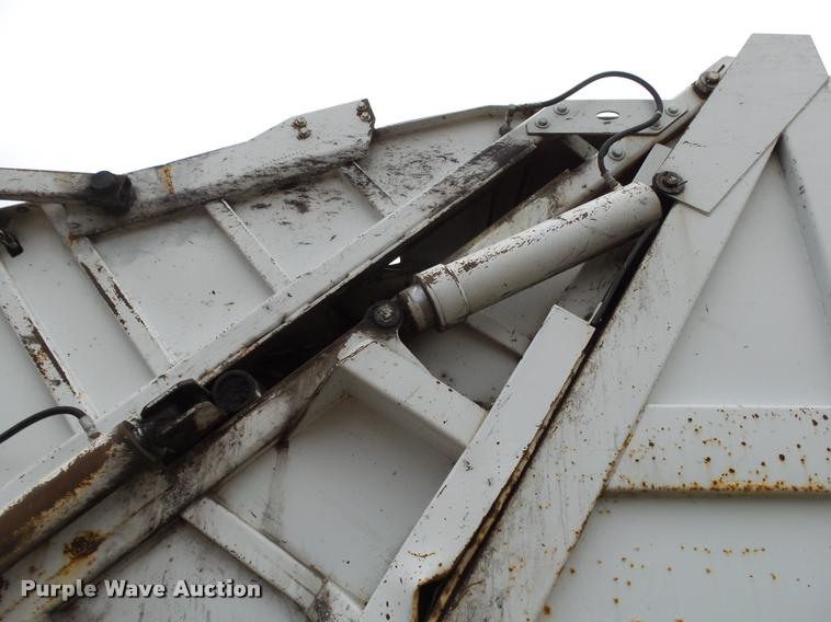 image for item K1010 2002 GMC C8500 refuse truck