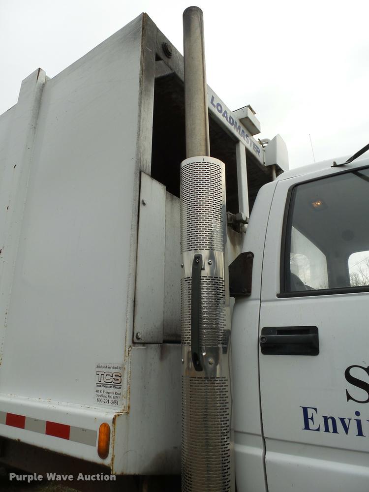 image for item K1010 2002 GMC C8500 refuse truck