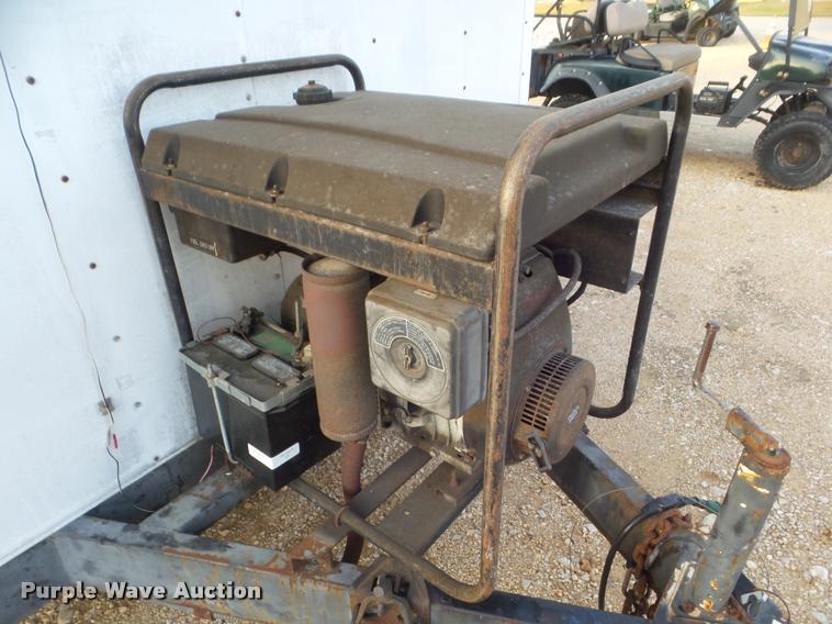 image for item DA5193 1990 Wells Cargo enclosed cargo trailer with generator