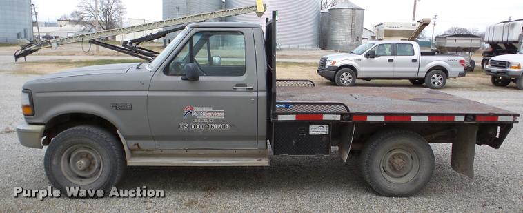 image for item DB5405 1995 Ford F250 flatbed pickup truck