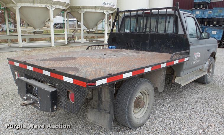 image for item DB5405 1995 Ford F250 flatbed pickup truck