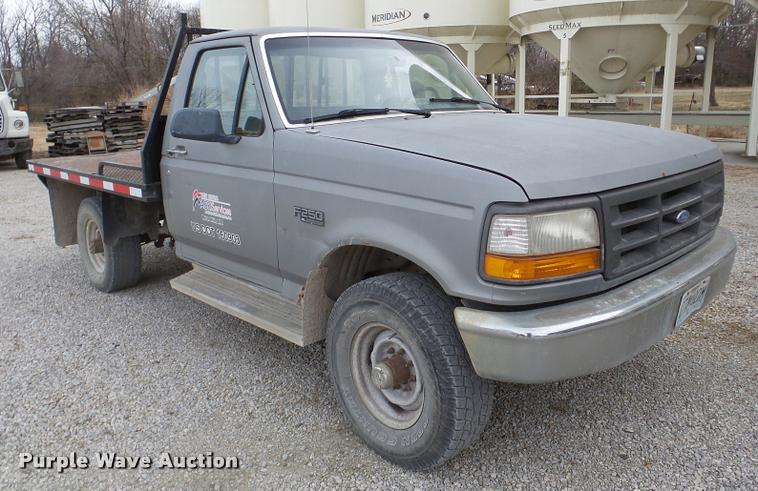 image for item DB5405 1995 Ford F250 flatbed pickup truck