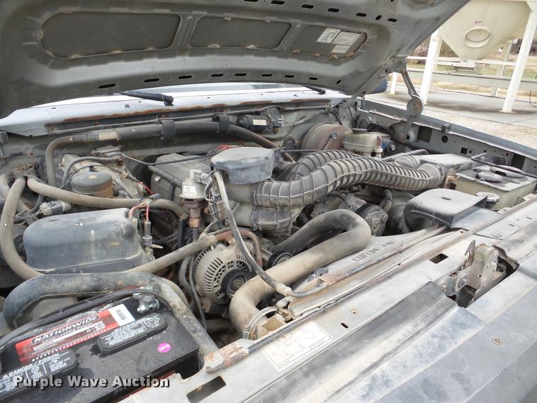 image for item DB5405 1995 Ford F250 flatbed pickup truck