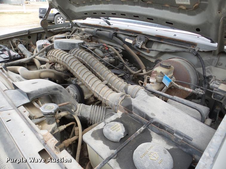 image for item DB5405 1995 Ford F250 flatbed pickup truck