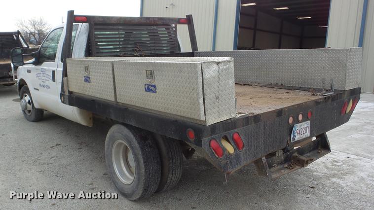 image for item AG9278 2000 Ford F350 Super Duty SuperCab flatbed pickup truck