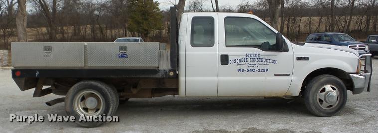 image for item AG9278 2000 Ford F350 Super Duty SuperCab flatbed pickup truck