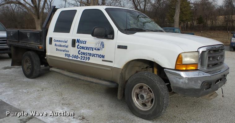 image for item AG9279 2000 Ford F250 Super Duty Crew Cab flatbed pickup truck