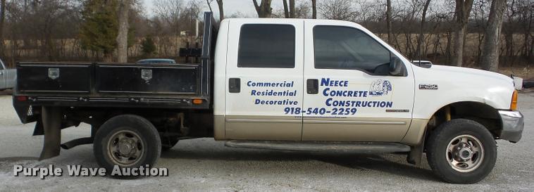 image for item AG9279 2000 Ford F250 Super Duty Crew Cab flatbed pickup truck