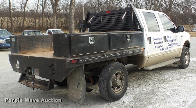 image for item AG9279 2000 Ford F250 Super Duty Crew Cab flatbed pickup truck