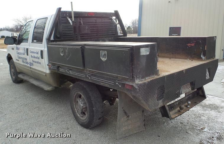 image for item AG9279 2000 Ford F250 Super Duty Crew Cab flatbed pickup truck
