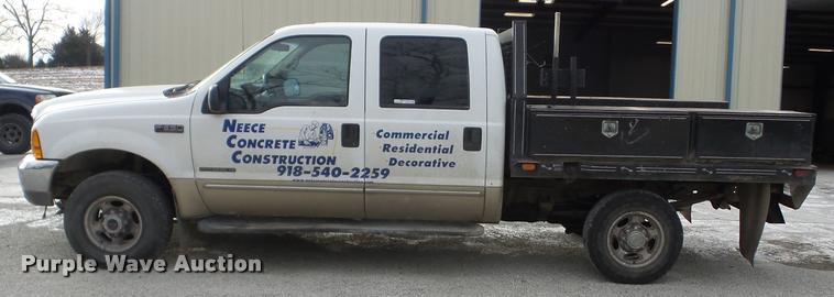 image for item AG9279 2000 Ford F250 Super Duty Crew Cab flatbed pickup truck