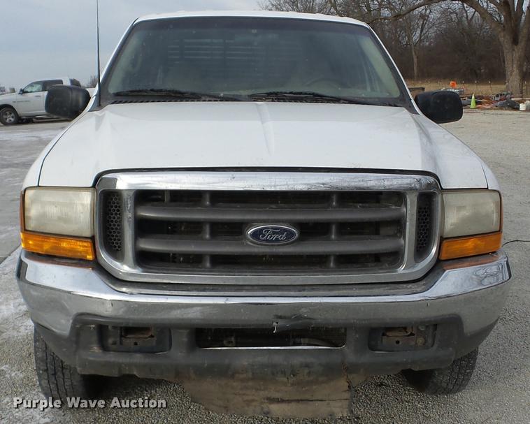 image for item AG9279 2000 Ford F250 Super Duty Crew Cab flatbed pickup truck