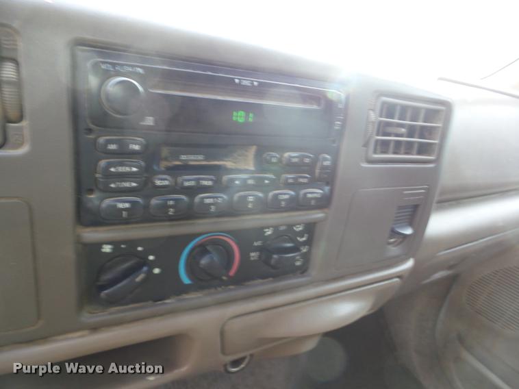 image for item AG9279 2000 Ford F250 Super Duty Crew Cab flatbed pickup truck