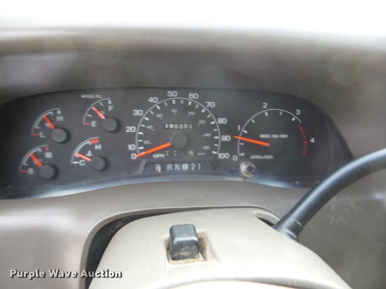 image for item AG9279 2000 Ford F250 Super Duty Crew Cab flatbed pickup truck