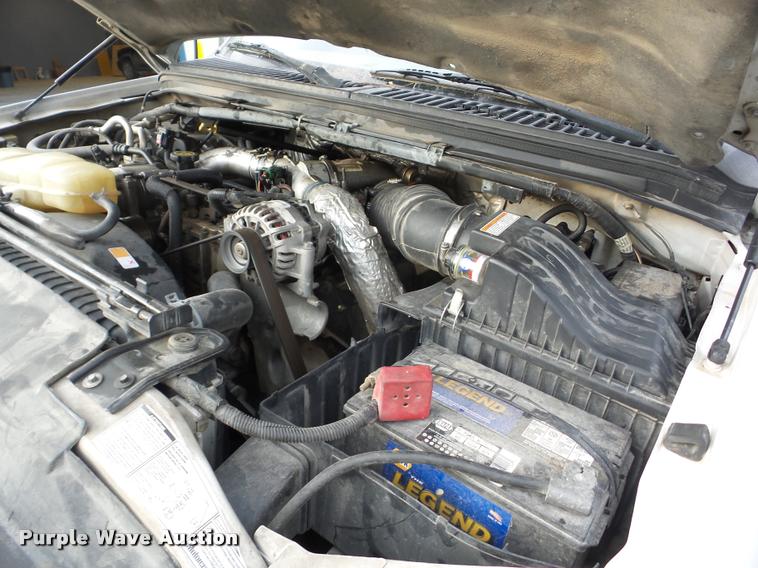 image for item AG9279 2000 Ford F250 Super Duty Crew Cab flatbed pickup truck