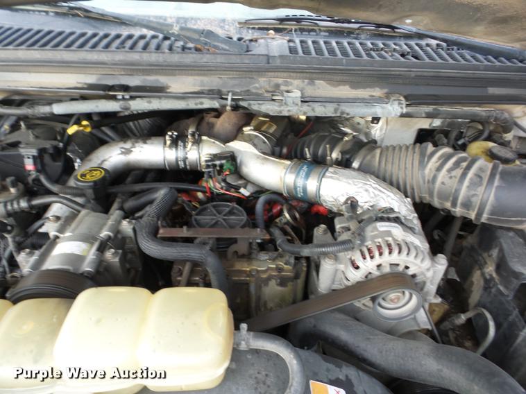 image for item AG9279 2000 Ford F250 Super Duty Crew Cab flatbed pickup truck