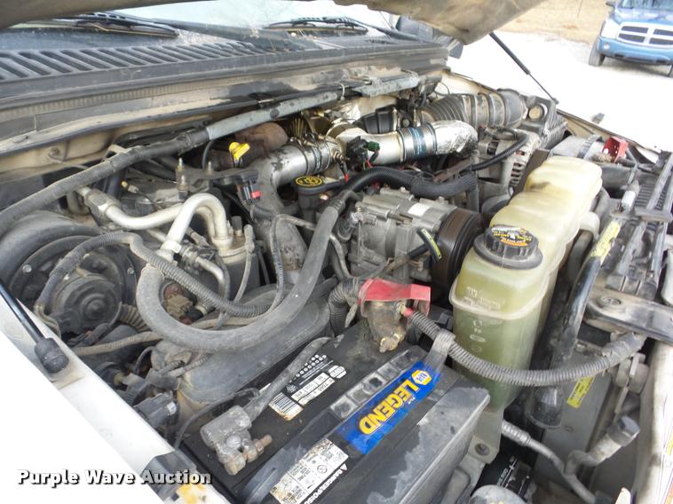 image for item AG9279 2000 Ford F250 Super Duty Crew Cab flatbed pickup truck