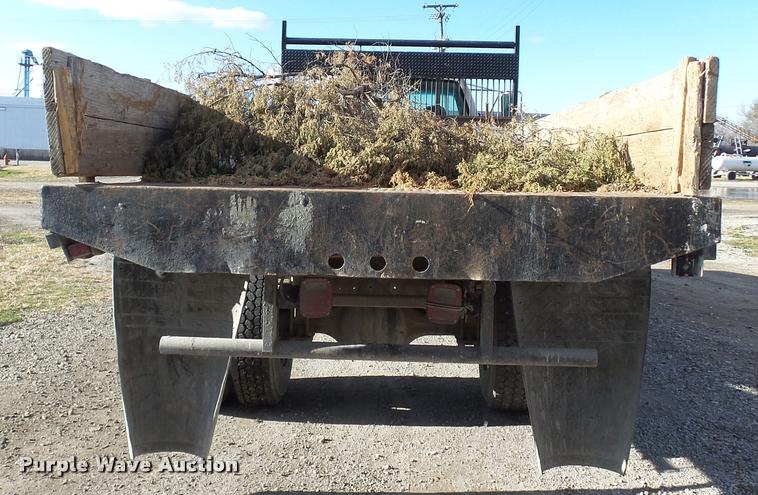 image for item DB2753 2001 GMC C7500 dump flatbed truck