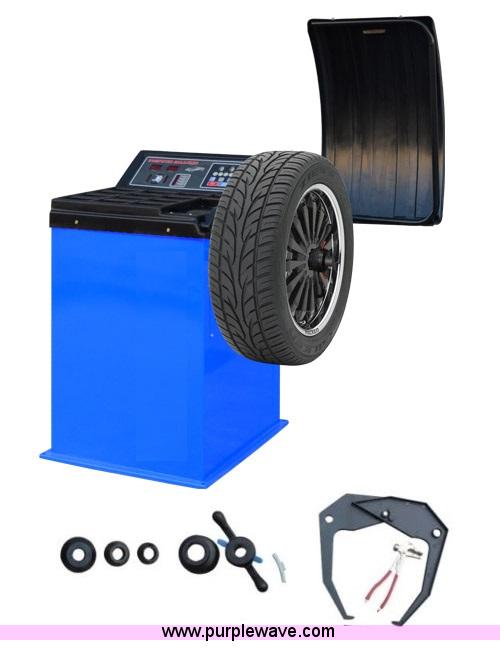 image for item F1903 Tire machine and wheel balancer