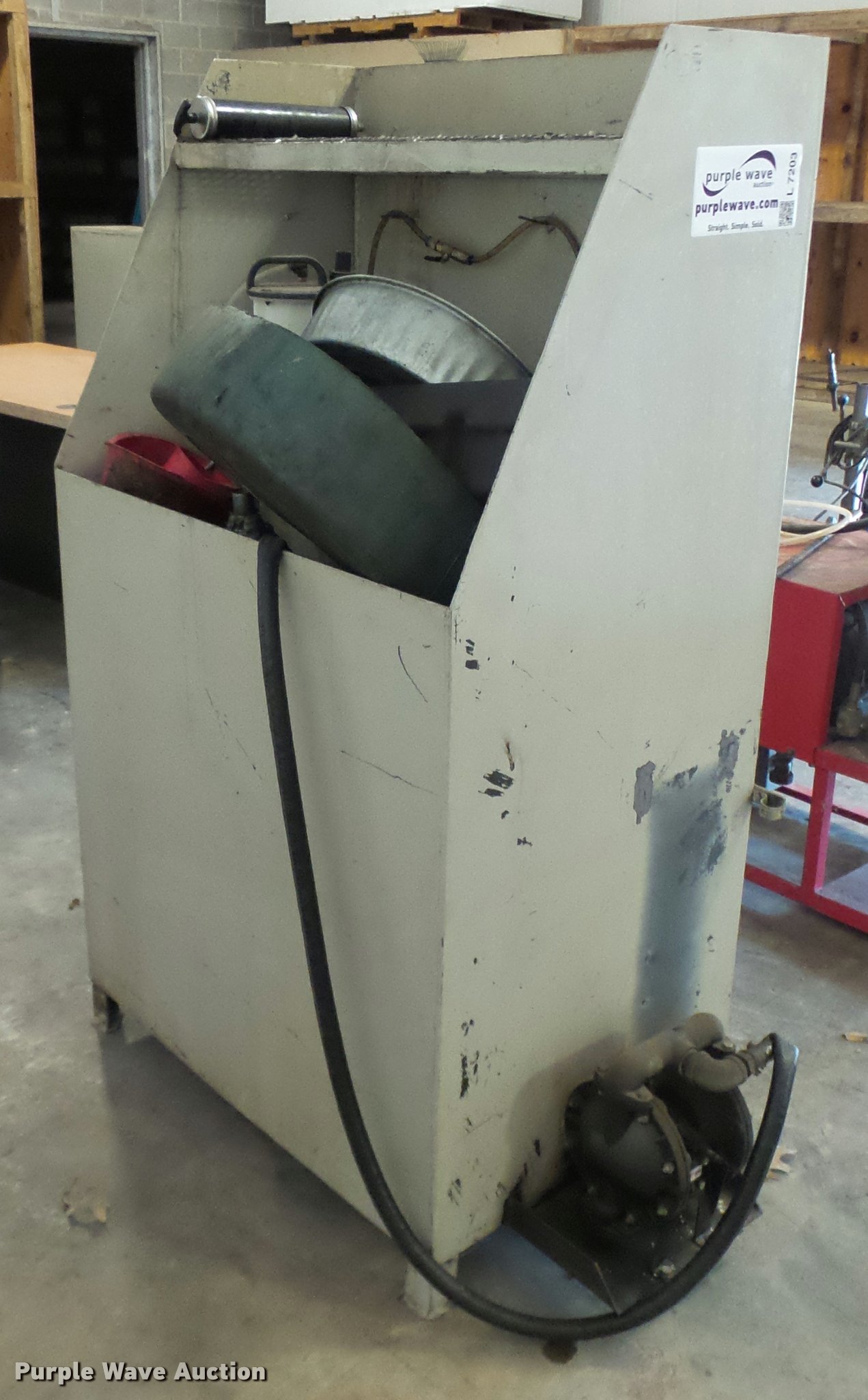 Waste oil bin in Kansas City, MO Item L7203 sold Purple Wave