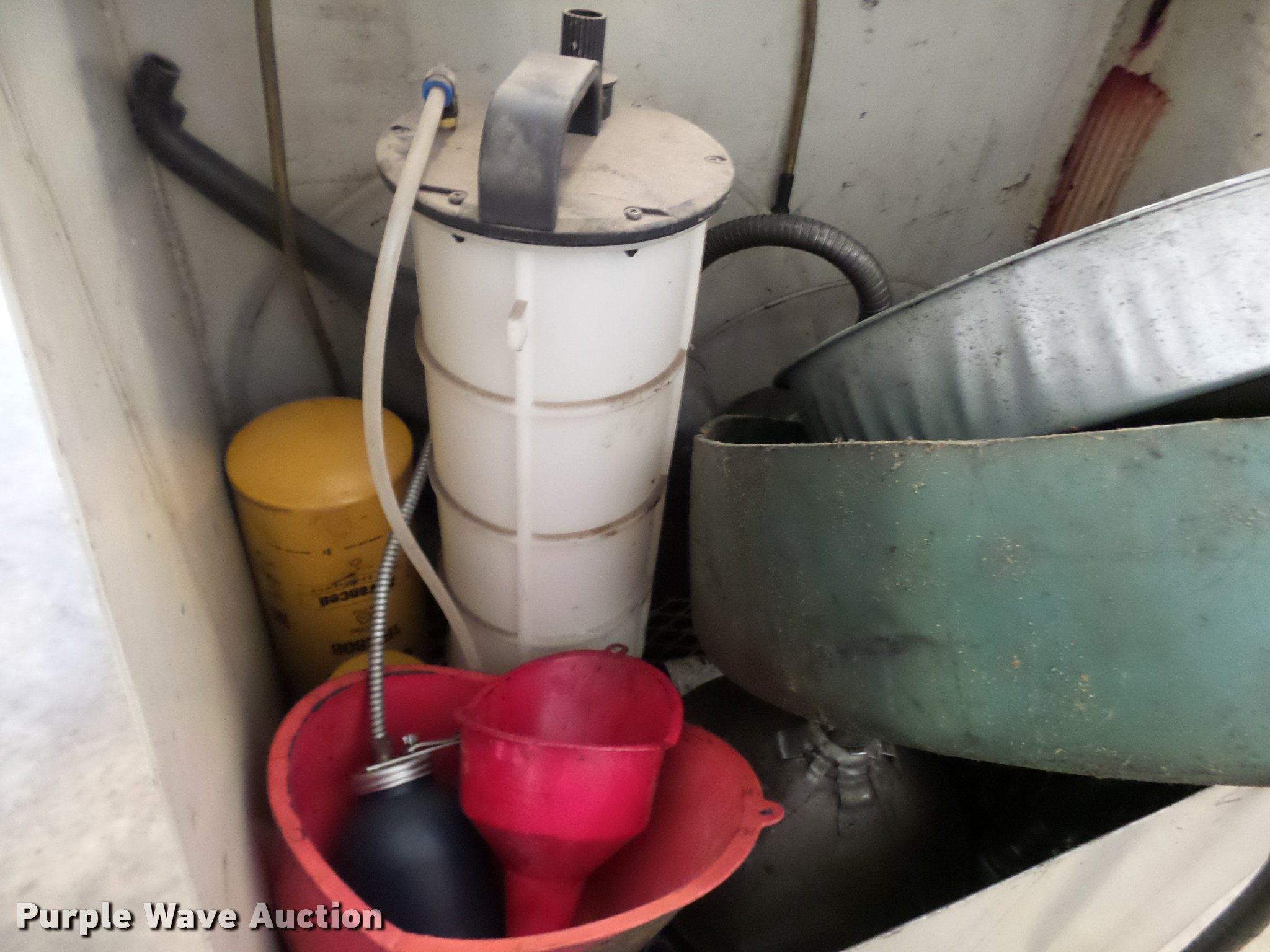 Waste oil bin in Kansas City, MO Item L7203 sold Purple Wave