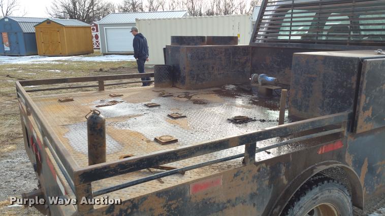 image for item DA5829 2008 Ford F450 Super Duty Crew Cab flatbed truck