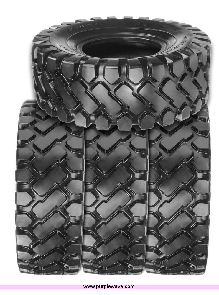 image for item F1056 (4) 20.5x25 loader tires