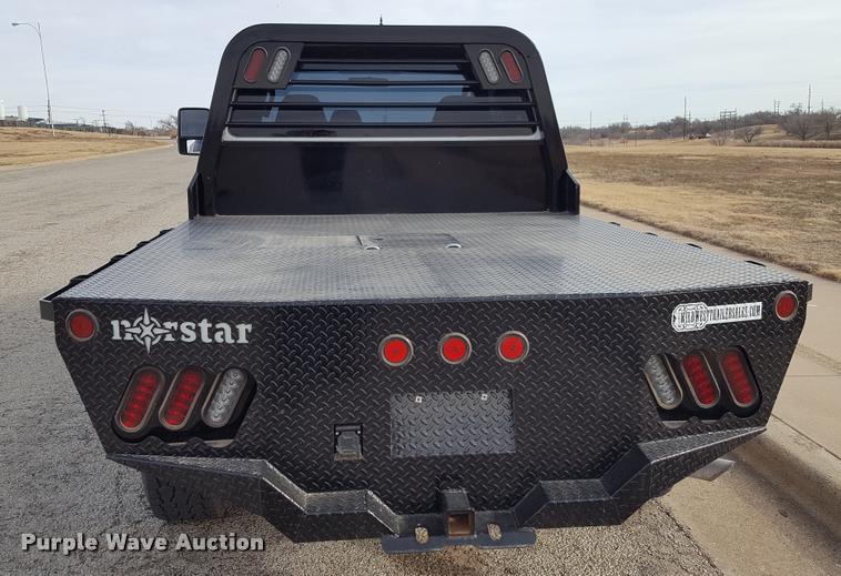 image for item L1726 2010 Ford F250 Super Duty SuperCab flatbed pickup truck