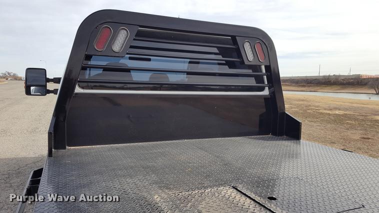 image for item L1726 2010 Ford F250 Super Duty SuperCab flatbed pickup truck