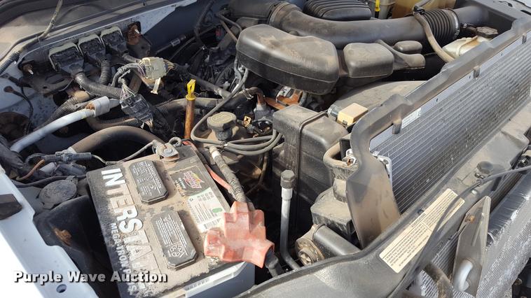 image for item L1726 2010 Ford F250 Super Duty SuperCab flatbed pickup truck