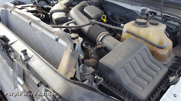 image for item L1726 2010 Ford F250 Super Duty SuperCab flatbed pickup truck