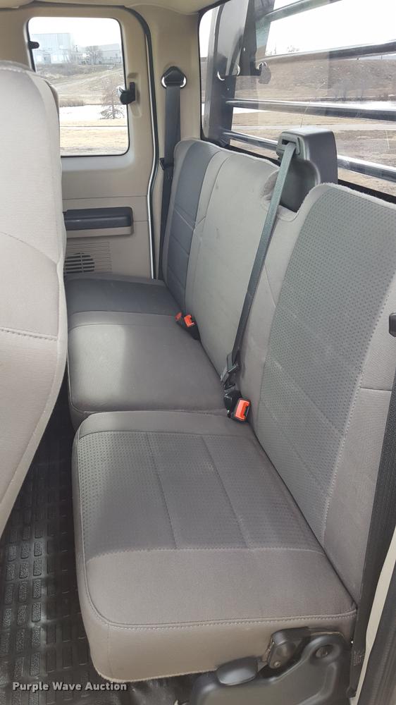 image for item L1726 2010 Ford F250 Super Duty SuperCab flatbed pickup truck